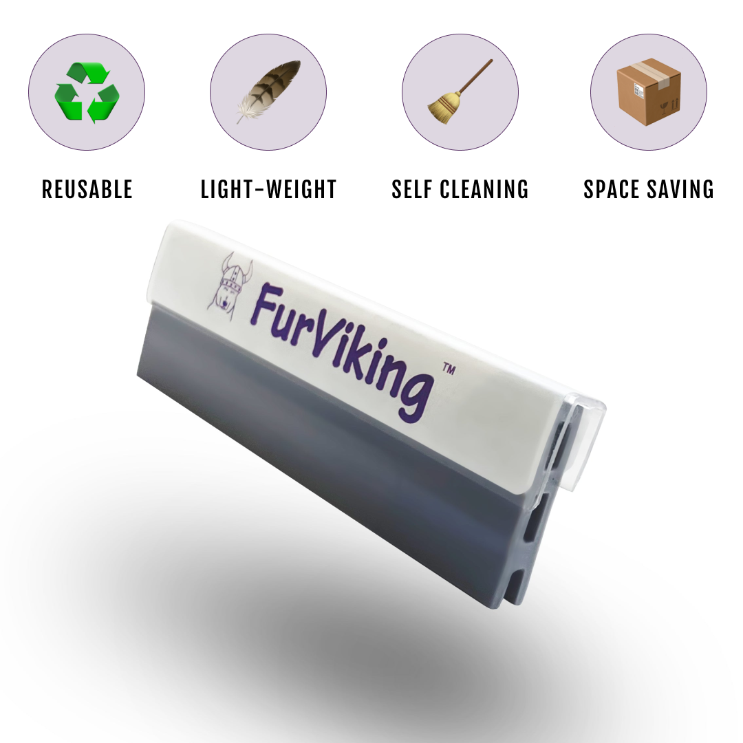 FurViking pet hair remover tool. A gray, rectangular tool with a white top and a clear plastic handle. The FurViking logo with a Viking and dog is on the white top. Icons indicate the tool is reusable, lightweight, self-cleaning, and space-saving.